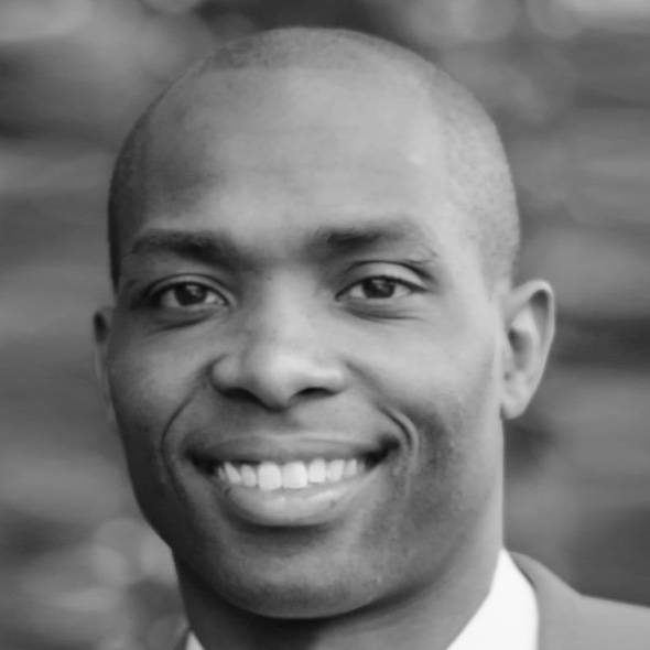 Andrew-Patterson-Greenfly-VP-of-Partnerships Black and white portrait of Andrew Patterson, VP of Partnerships at Greenfly
